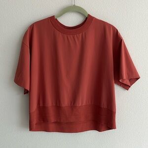 Athleta cropped zephyr shirt, size S, rust red